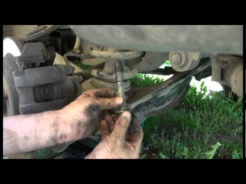 Как заменить нижний рычаг задней подвески на Ford Explorer 2002